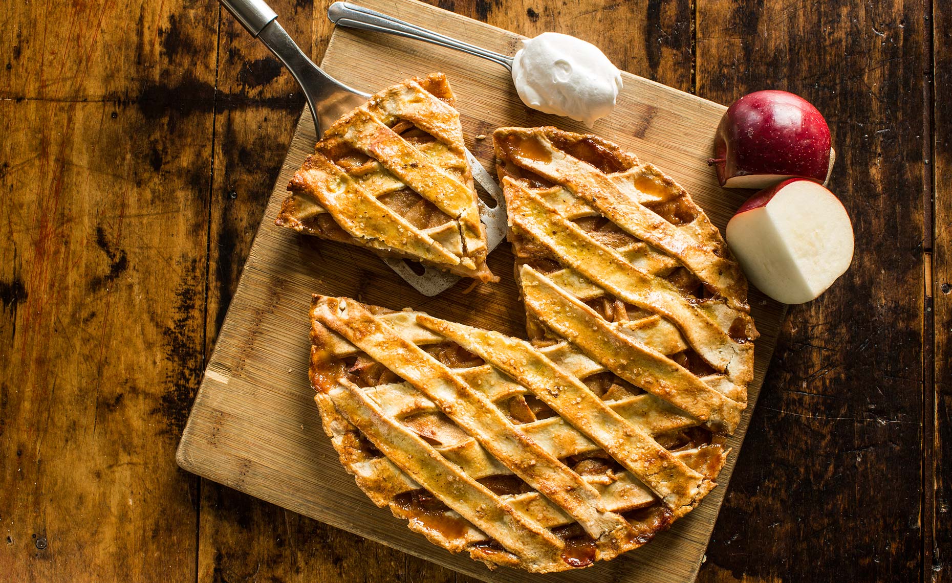 Fresh apple pie on wood surface