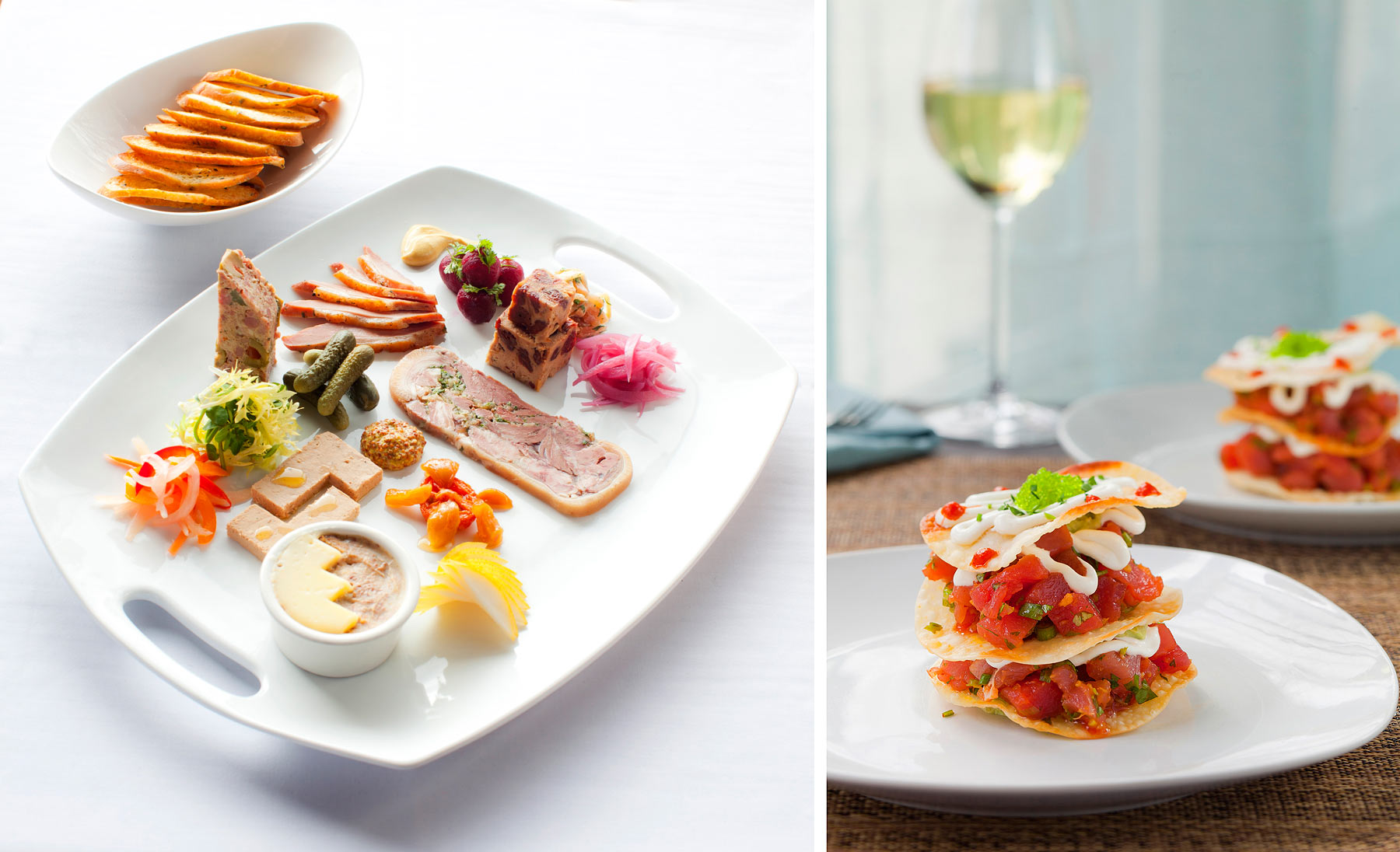 Charcuterie plate on white plate and tuna tartar